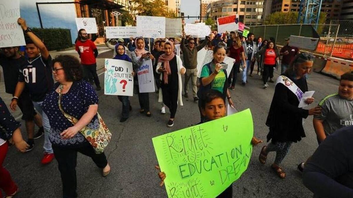 Lexington supporters of the Deferred Action for Childhood Arrivals, which protects young immigrants from deportation, protested plans to end the program.