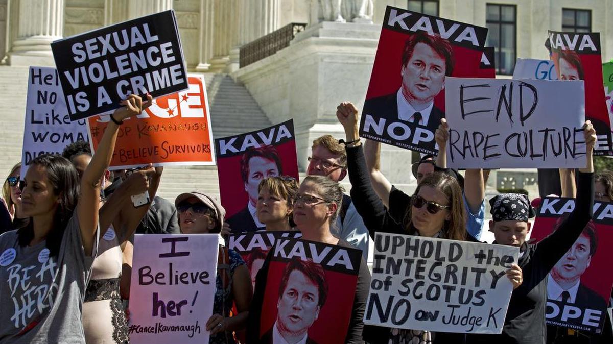 Protesters rally against Supreme Court nominee Brett Kavanaugh as the Senate Judiciary Committee debates his confirmation, Friday, Sept. 28, 2018, at the Supreme Court in Washington.