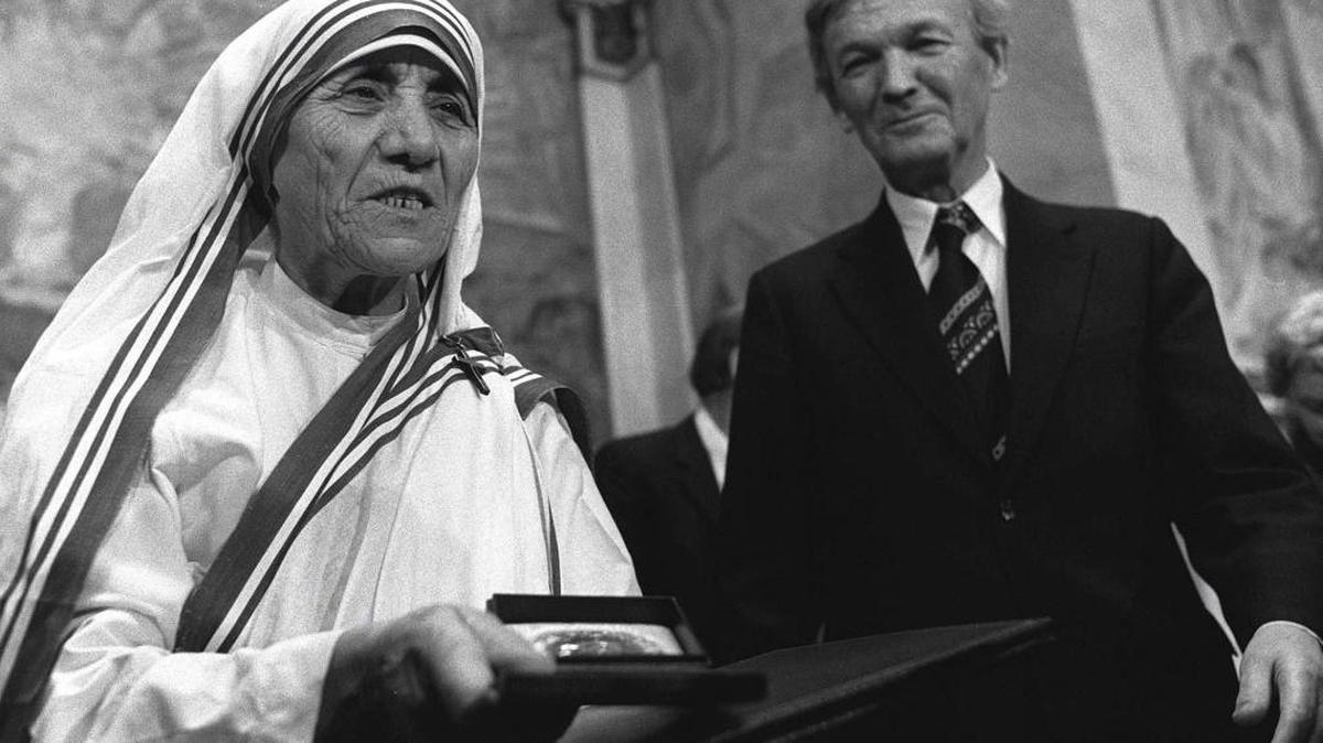 In this file photo from 1979, Mother Teresa receives the Nobel Peace Prize during a ceremony at Oslo University. At right is the Chairman of the Norwegian Nobel Committee, Professor John Sanness. Before Pope Francis could complete Mother Teresa’s canonization on Sept. 4, the late nun’s critics were already howling.