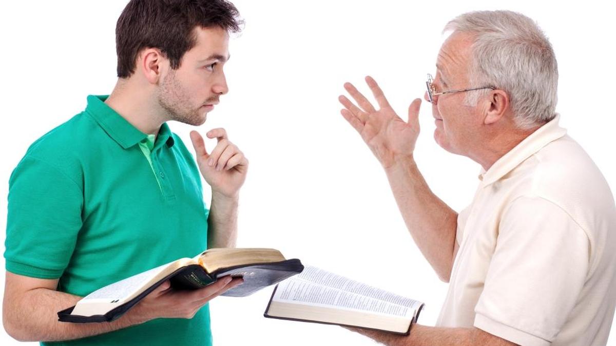 Old man sharing God's Words with a young man