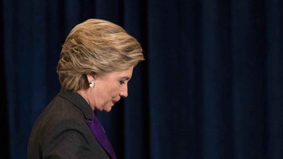 Democratic presidential candidate Hillary Clinton walks off the stage after speaking in New York, Wednesday, Nov. 9, 2016. Clinton conceded the presidency to Donald Trump in a phone call early Wednesday morning, a stunning end to a campaign that appeared poised right up until election day to make her the first woman elected U.S. president.