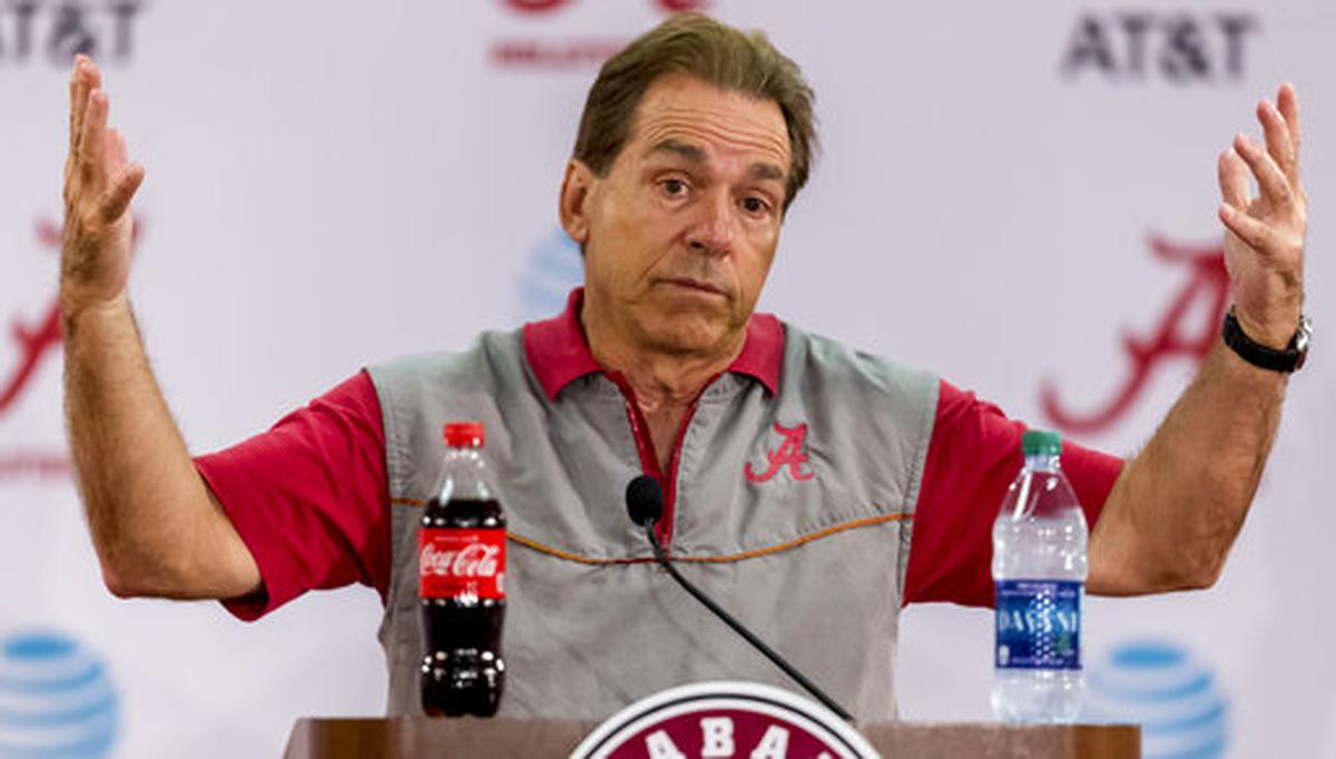 Alabama football coach Nick Saban talks with the media.