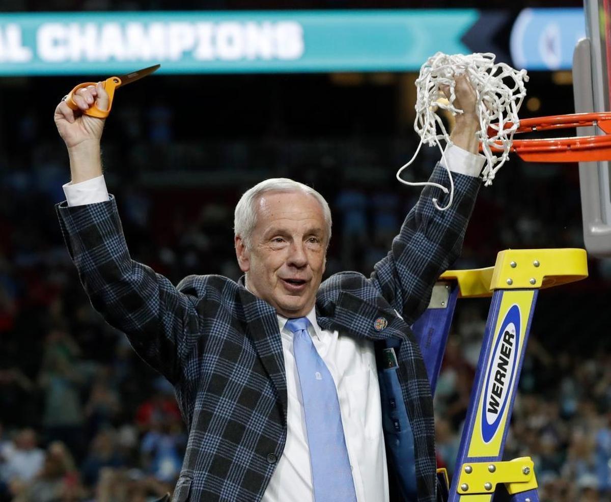 North Carolina head coach Roy Williams cut down the net after UNC beat Gonzaga to win the 2017 national championship. Under Williams, North Carolina also won titles in 2005 and 2009.