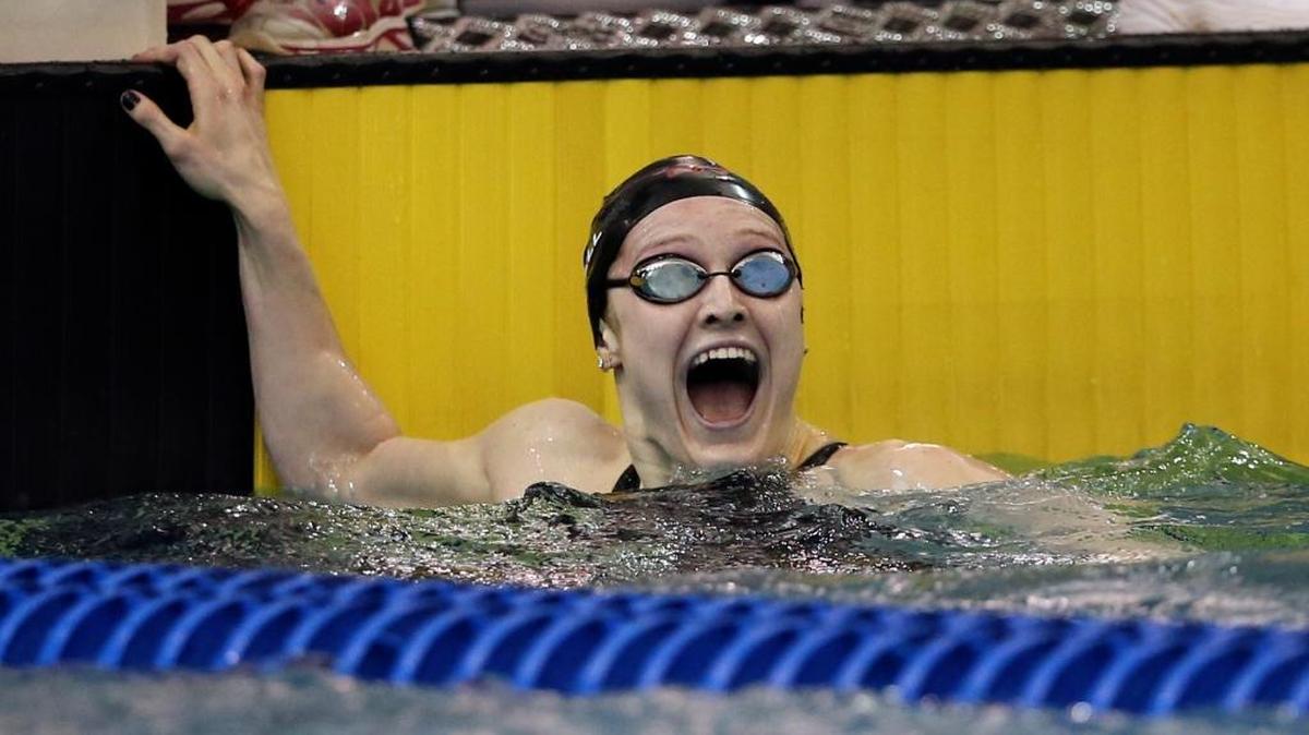 Louisville’s Kelsi Worrell reacts after winning the 100-yard Butterfly championship during the NCAA college Swimming and Diving Championships at Georgia Tech on Friday, March 18, 2016, in Atlanta.