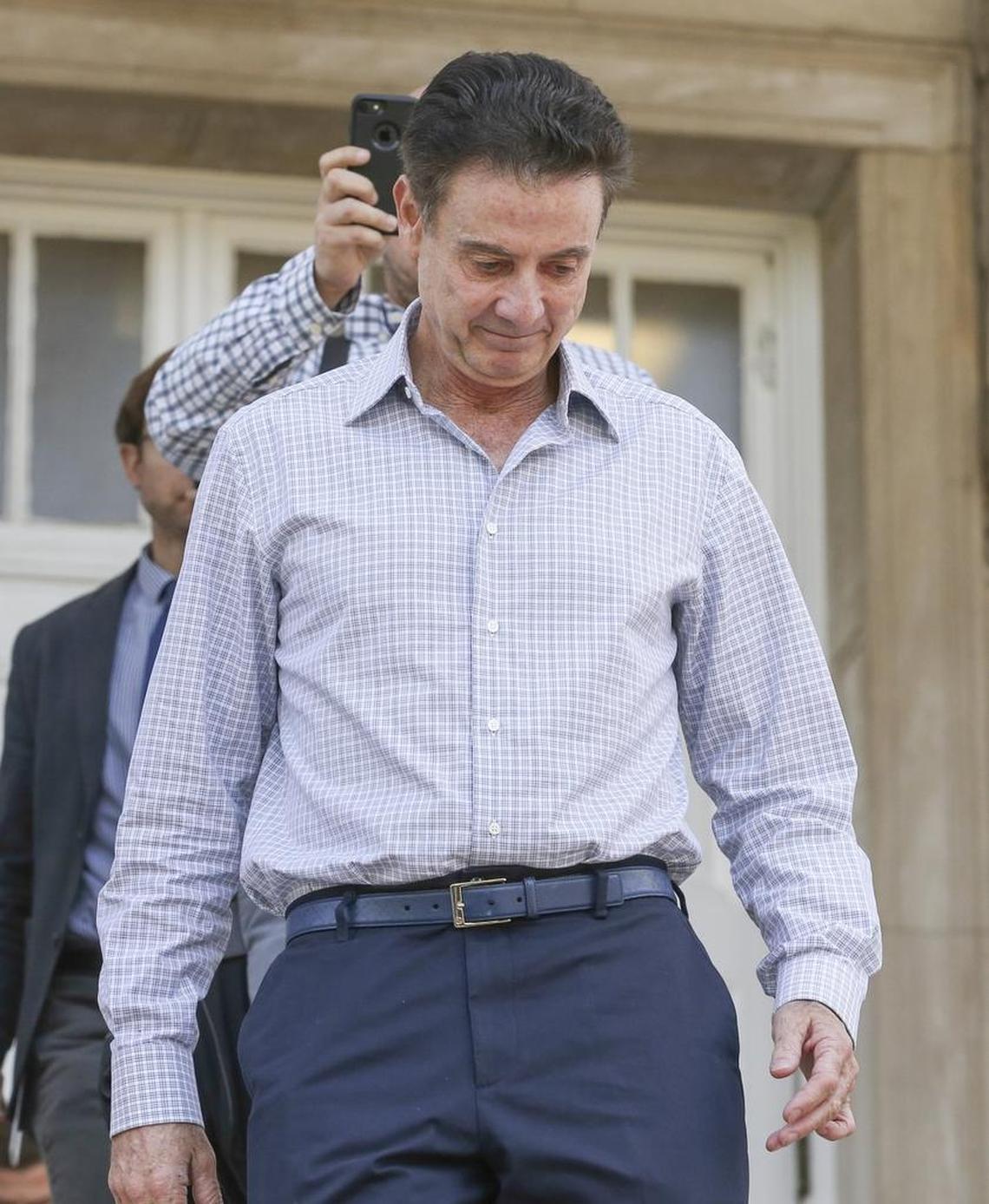 Rick Pitino leaves Grawemeyer Hall after having a meeting with the U of L interim president Greg Postel on Wednesday.