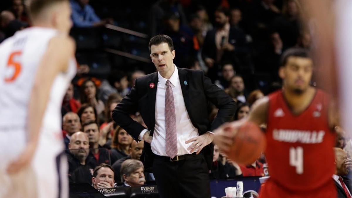 Louisville interim coach David Padgett watched his team play during the first half against Virginia in the quarterfinals of the Atlantic Coast Conference Tournament on Thursday.