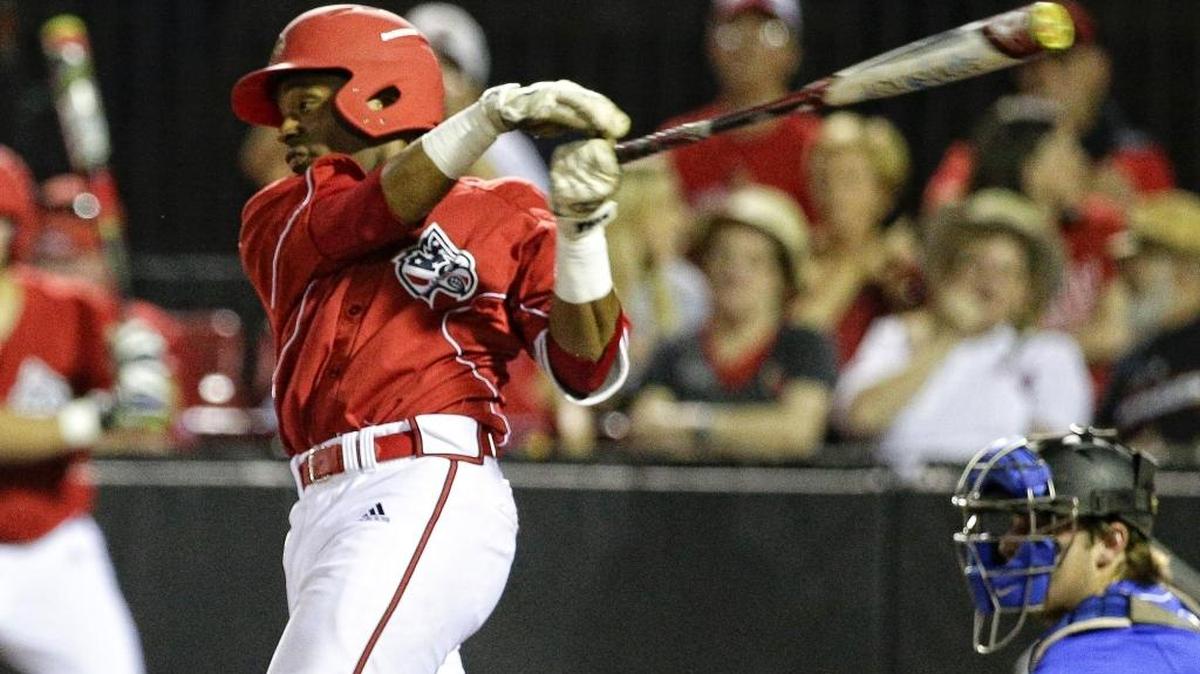 Louisville’s Devin Hairston (29) singled to right to knock in the winning run as Louisville defeated Kentucky 7-6 on Tuesday April 18, 2016, in Louisville, Ky.