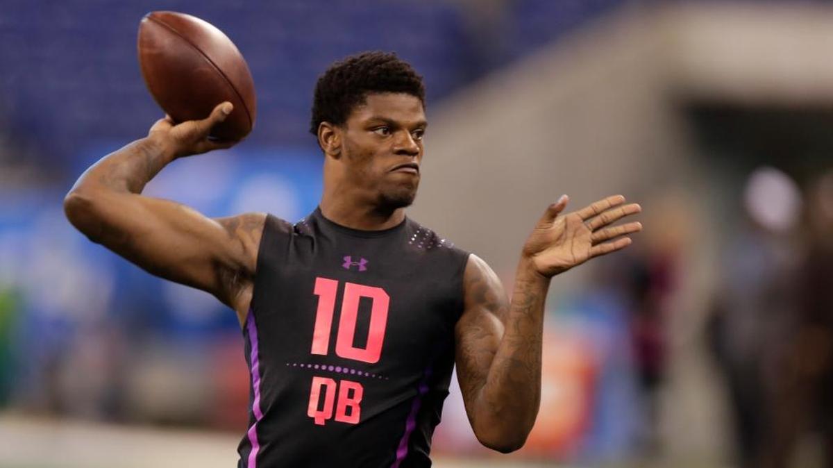 Louisville quarterback Lamar Jackson runs a drill at the NFL football scouting combine in Indianapolis, Saturday, March 3, 2018.