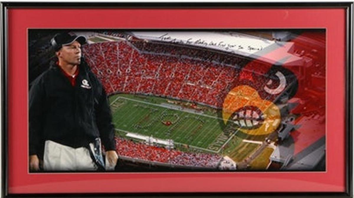 A University of Louisville poster personally signed by then-first-year head Coach Bobby Petrino for sale on Ebth.com.