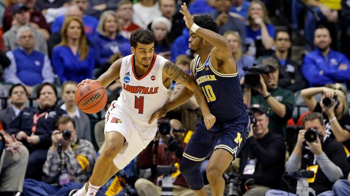 Quentin Snider (4) is one of only two seniors on the 2017-18 University of Louisville men’s basketball roster. The other is 7-foot forward Anas Mahmoud.