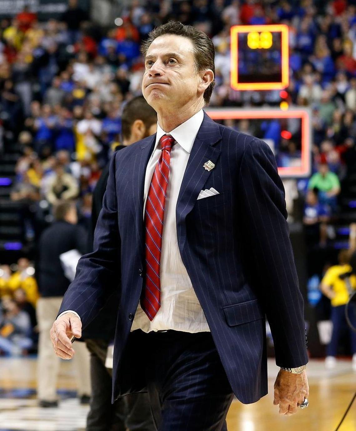 Rick Pitino walked off the court after Louisville lost to the Michigan in the second round of the NCAA Tournament in Bankers Life Fieldhouse in Indianapolis in March.