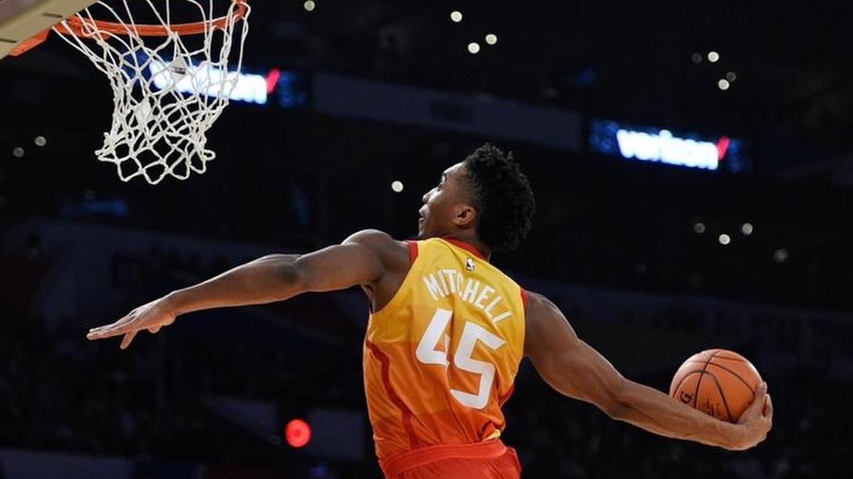 Utah Jazz’s Donovan Mitchell goes up for a dunk during the NBA basketball All-Star weekend slam dunk contest Saturday, Feb. 17, 2018, in Los Angeles. Mitchell won the event.