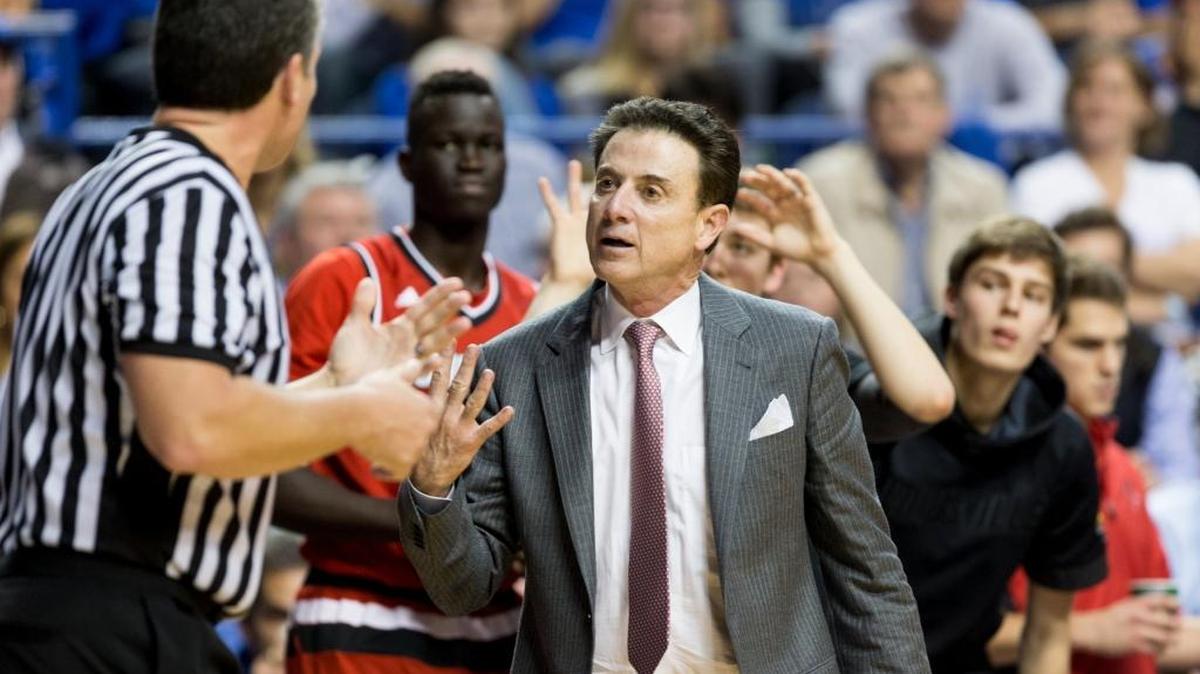 Louisville Coach Rick Pitino, right, argued a call with Doug Shows in the second half against Kentucky on Saturday, Dec. 26, 2015, in Rupp Arena.