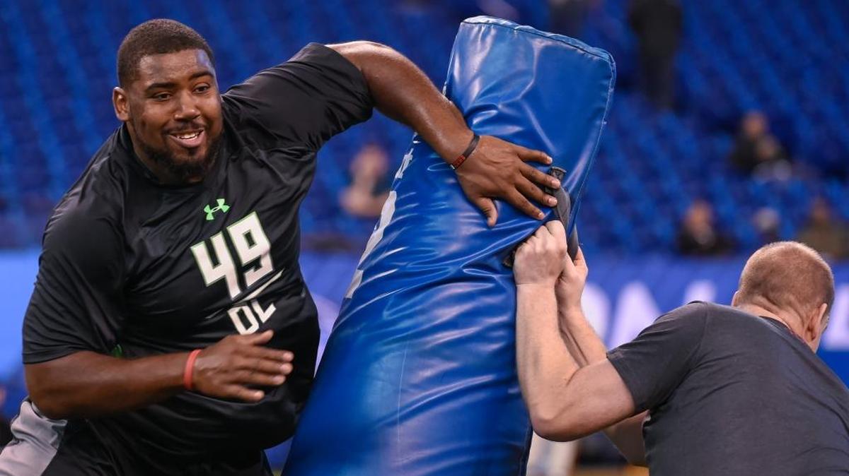Former Louisville defensive lineman Sheldon Rankins ran a drill at the NFL football scouting combine on Sunday, Feb. 28, 2016, in Indianapolis.