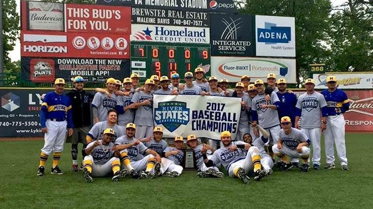 The Midway University baseball team posed with its River States Conference championship banner after defeating West Virginia Tech, 9-7, in the second game of the championship series to win the conference title Tuesday in the program’s first season of play.