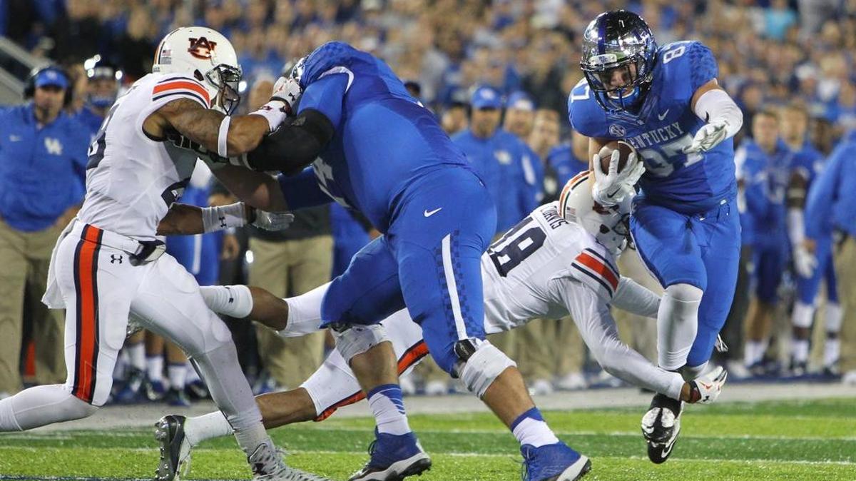 C.J. Conrad made a play for Kentucky in its 30-27 loss to Auburn at Commonwealth Stadium in 2015. Conrad has been named to the John Mackey Award watch list for 2017, which honors the nation’s top tight end.