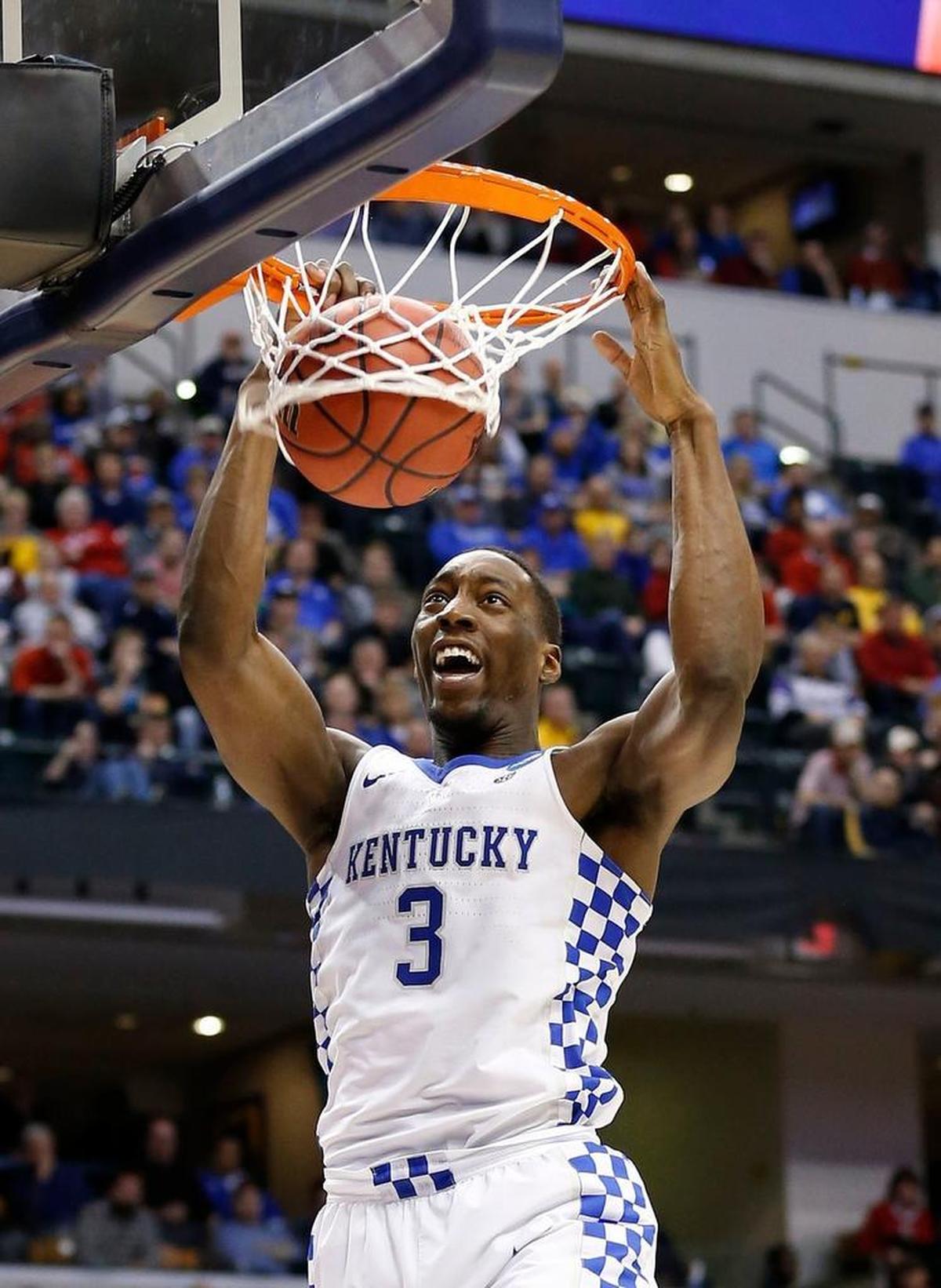 Kentucky Wildcats forward Edrice "Bam" Adebayo (3) dunked over Wichita State Shockers center Shaquille Morris (24) and Wichita State Shockers guard Conner Frankamp (33) as the University of Kentucky played Wichita State in the second round of the NCAA tournament in Bankers Life Fieldhouse in Indianapolis, In., Sunday, March19, 2017. This is second half action. UK won 65-62.