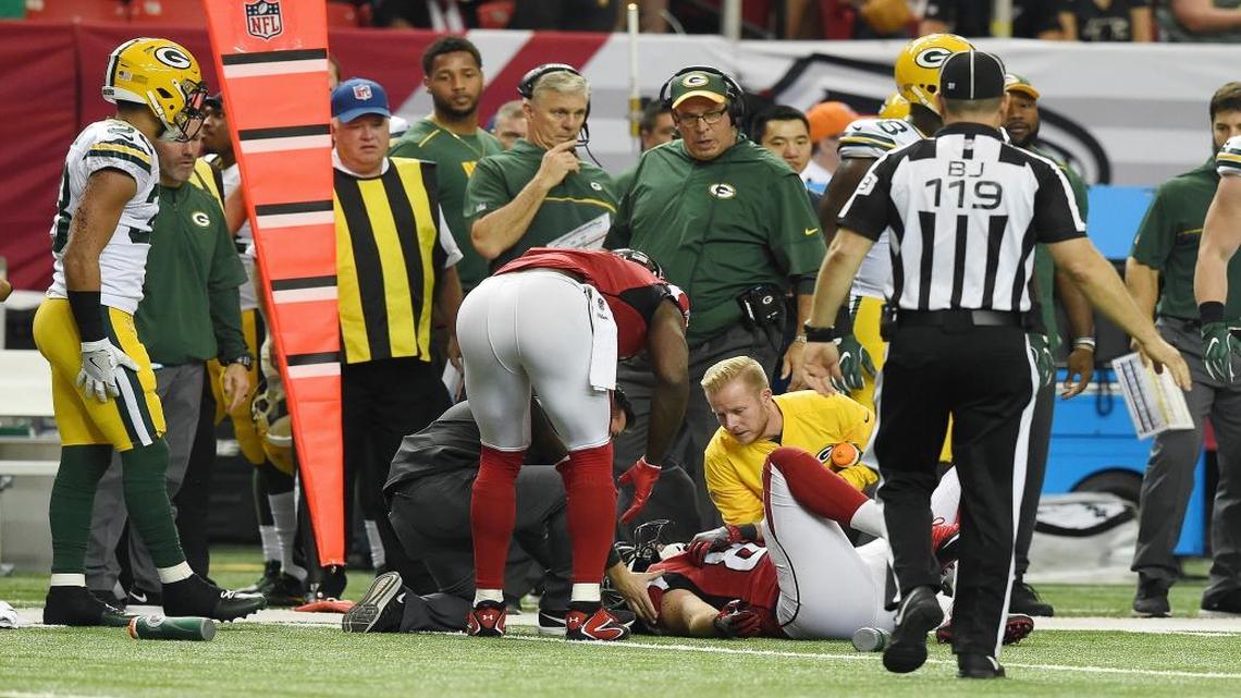 Atlanta Falcons tight end Jacob Tamme (83) lies on the turf after being injured on a run against the Green Bay Packers during the first of an NFL football game, Sunday, Oct. 30, 2016, in Atlanta.