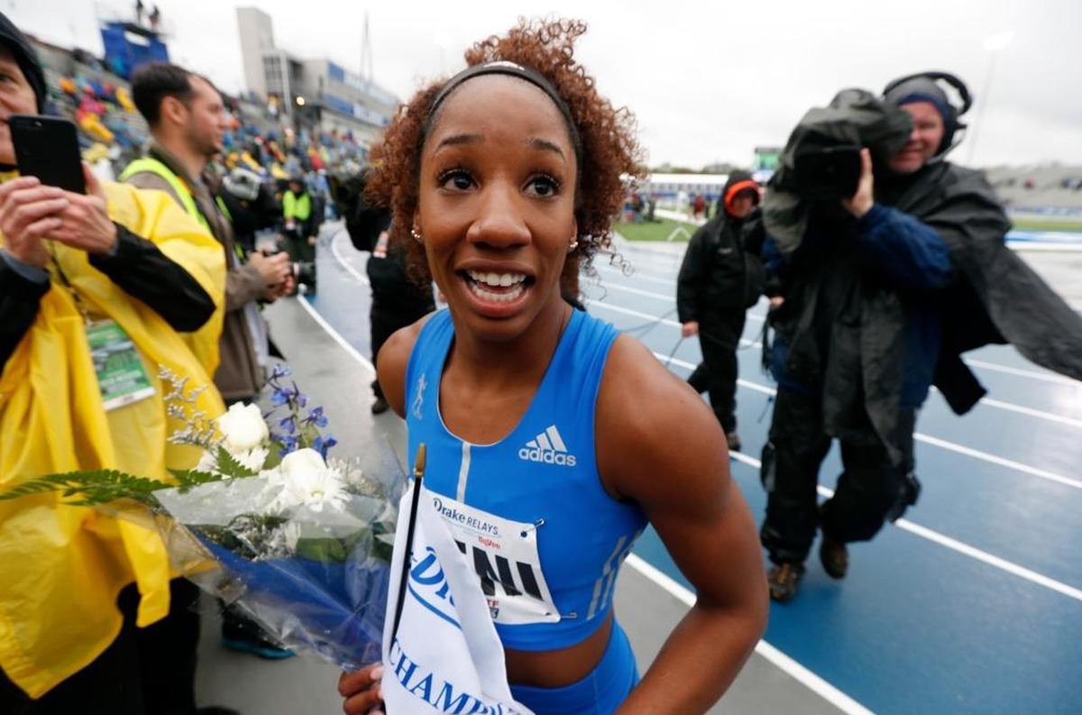 Kendra Harrison reacts to fans after winning the women's special 100-meter hurdles at the Drake Relays athletics meet, Saturday, April 29, 2017, in Des Moines, Iowa.