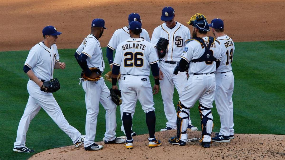 San Diego Padres manager Andy Green goes to the mound to bring in Padres' Ryan Buchter during the sixth inning on Monday, April 4, 2016, at Petco Park in San Diego.