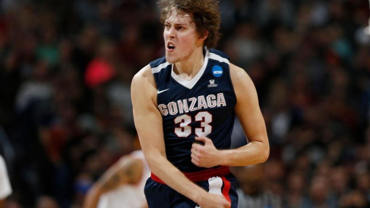 Gonzaga forward Kyle Wiltjer reacts after hitting a three-point basket against Utah during the first half of a second-round men's college basketball game Saturday, March 19, 2016, in the NCAA Tournament in Denver.