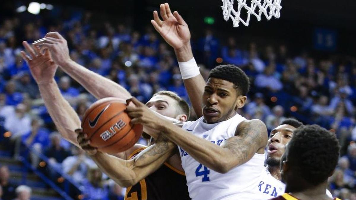 Kentucky guard Charles Matthews (4) pulled down an offensive rebound as Kentucky defeated Arizona State 72-58 on Dec. 11, 2015, in Lexington.