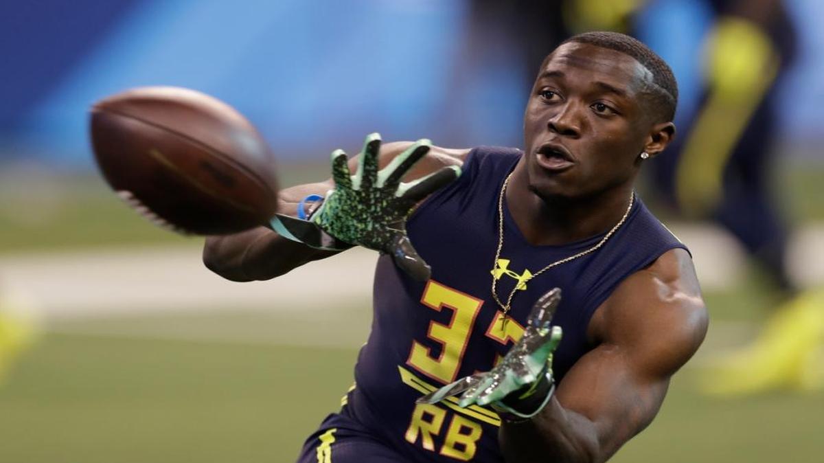 Kentucky running back Boom Williams ran a drill at the NFL football scouting combine Friday in Indianapolis.