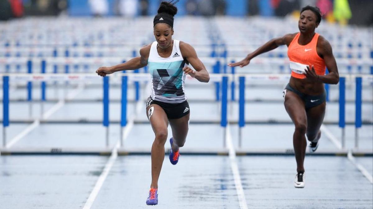 Kendra Harrison, center, eyed the finish line while winning the women’s special 100-meter hurdles at the Drake Relays on April 30, 2016, in Des Moines, Iowa.
