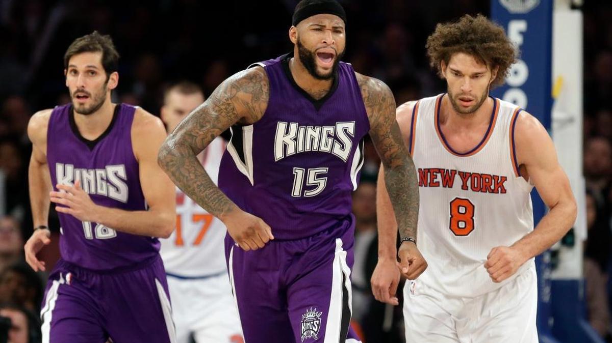 The Sacramento Kings’ DeMarcus Cousins, center, reacted after scoring during the second half against the Knicks on Sunday, March 20, 2016, in New York. The Kings won 88-80.