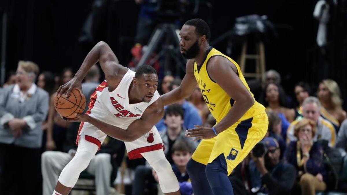 Indiana Pacers center Al Jefferson (25) defends Miami Heat center Bam Adebayo (13) during the second half of an NBA basketball game in Indianapolis, Wednesday, Jan. 10, 2018. The Heat defeated the Pacers 114-106.
