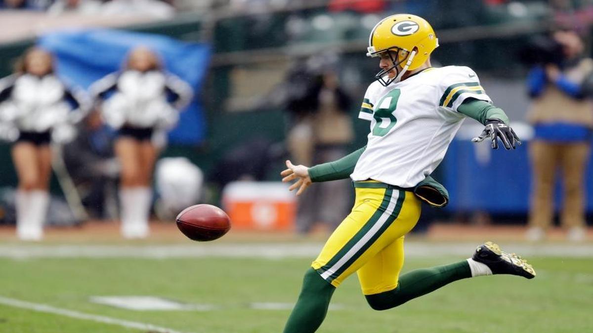 Green Bay Packers punter Tim Masthay (8) punts against the Oakland Raiders during an NFL football game Sunday, Dec. 20, 2015, in Oakland, Calif.