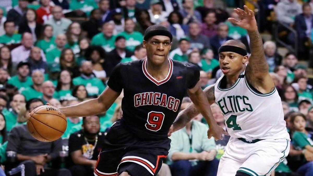 Chicago Bulls guard Rajon Rondo (9) drives towards the basket past Boston Celtics guard Isaiah Thomas (4) during the second quarter of a first-round NBA playoff basketball game in Boston, Tuesday, April 18, 2017.
