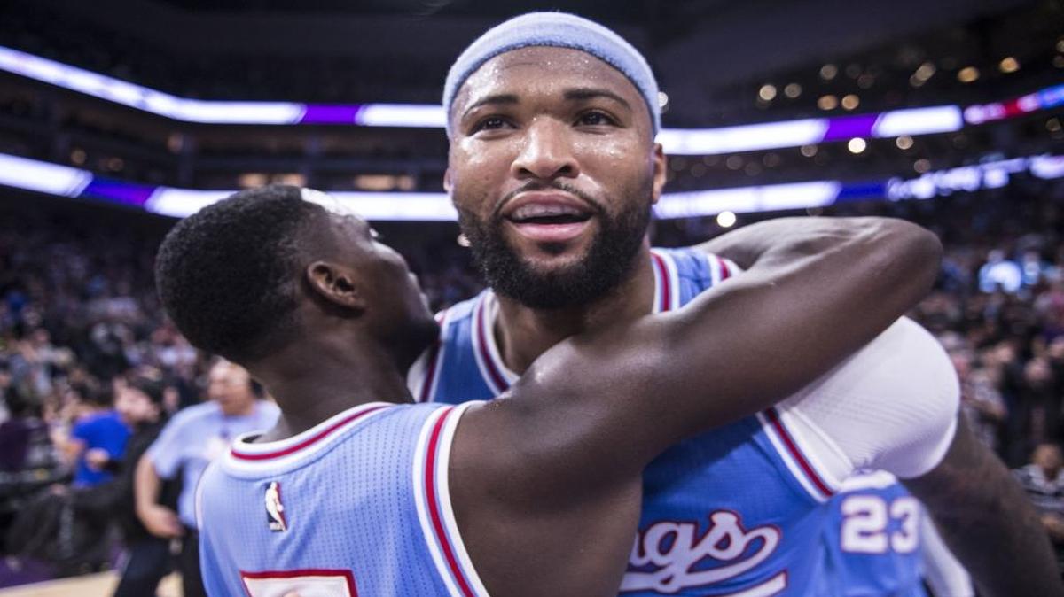 Sacramento Kings guard Darren Collison (7) congratulates teammate Sacramento Kings forward DeMarcus Cousins (15) after the victory against the Atlanta Hawks during their game at Golden 1 Center in Sacramento, Calif., on Friday, Feb. 10, 2017.