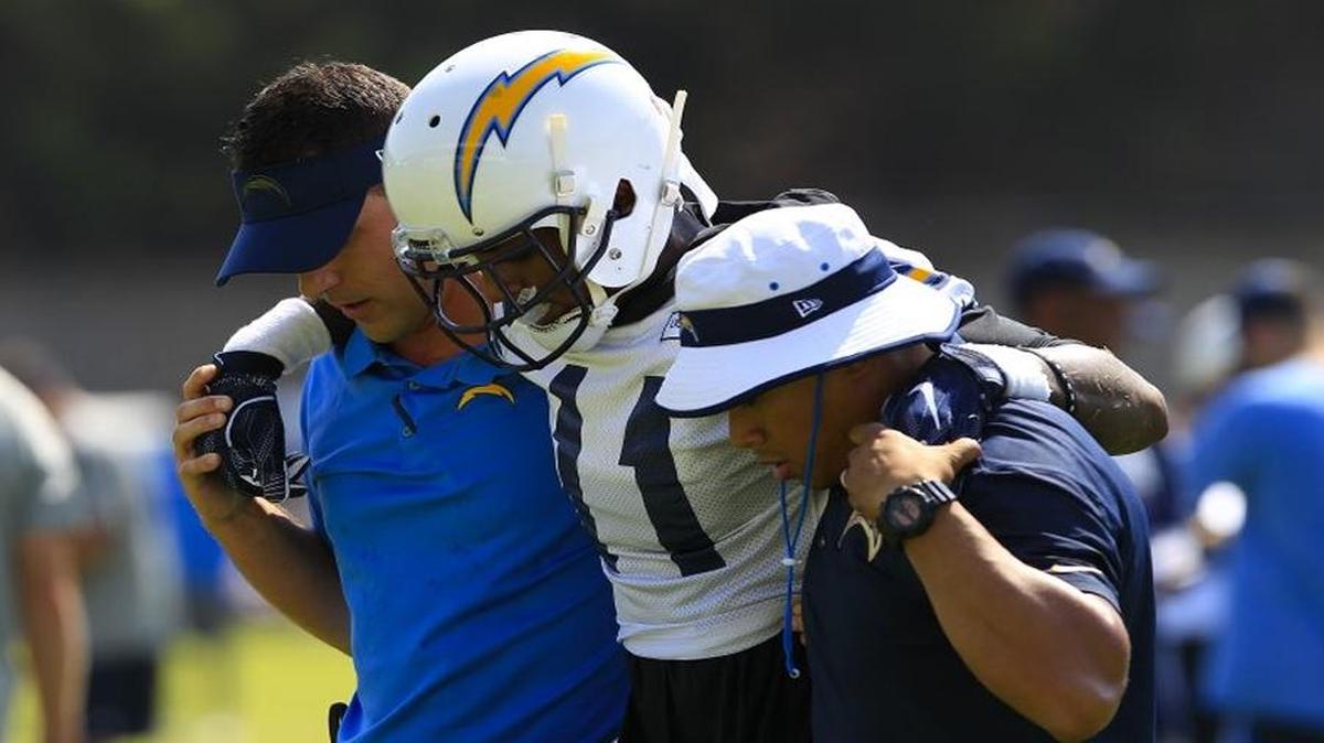 The Chargers’ Stevie Johnson was assisted off the field Sunday afternoon after running a play and was unable to resume practice.