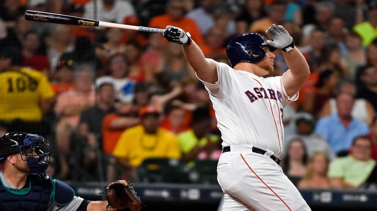 Houston Astros' A.J. Reed watches his two-run home run off Seattle Mariners' Taijuan Walker in the fourth inning of a baseball game, Tuesday, July 5, 2016, in Houston.