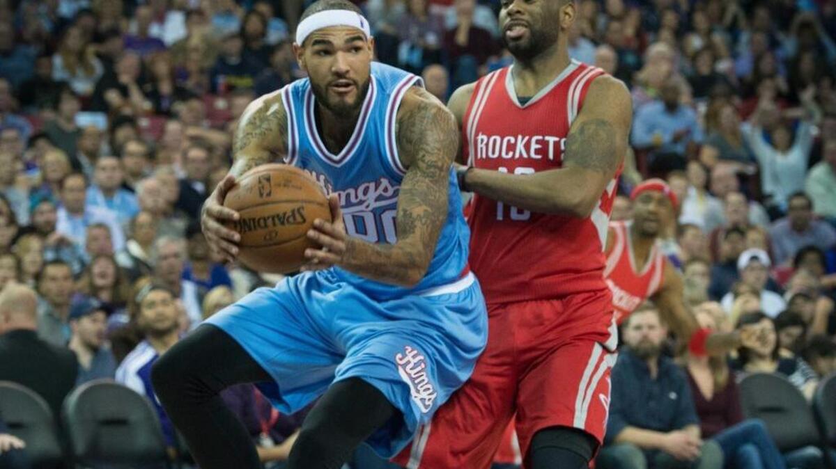 Sacramento Kings center Willie Cauley-Stein, left, grabbed a defensive rebound against Houston Rockets guard Marcus Thornton on Friday, Nov. 6, 2015, in Sacramento, Calif.