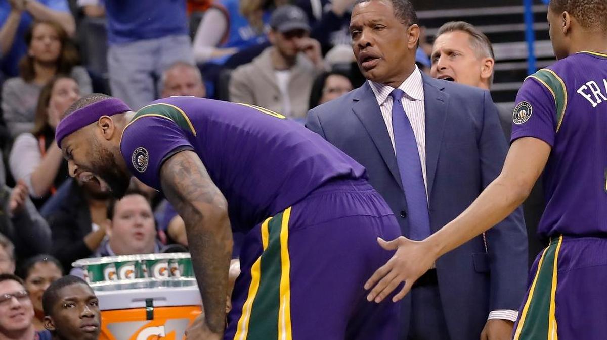 New Orleans Pelicans forward DeMarcus Cousins (0) reacts after fouling out as New Orleans Pelicans head coach Alvin Gentry looks on during the second half of an NBA basketball game in Oklahoma City, Sunday, Feb. 26, 2017. Oklahoma City won 118-110.