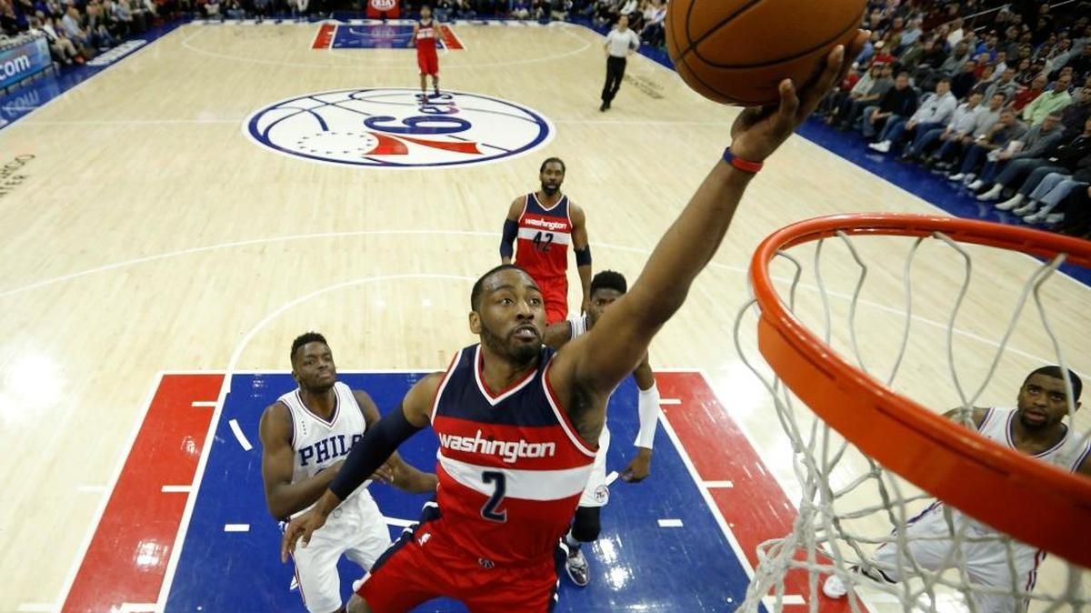 The Wizards’ John Wall went up for a shot during the second half against the 76ers on Friday, Feb. 26, 2016, in Philadelphia. Washington won 103-94.