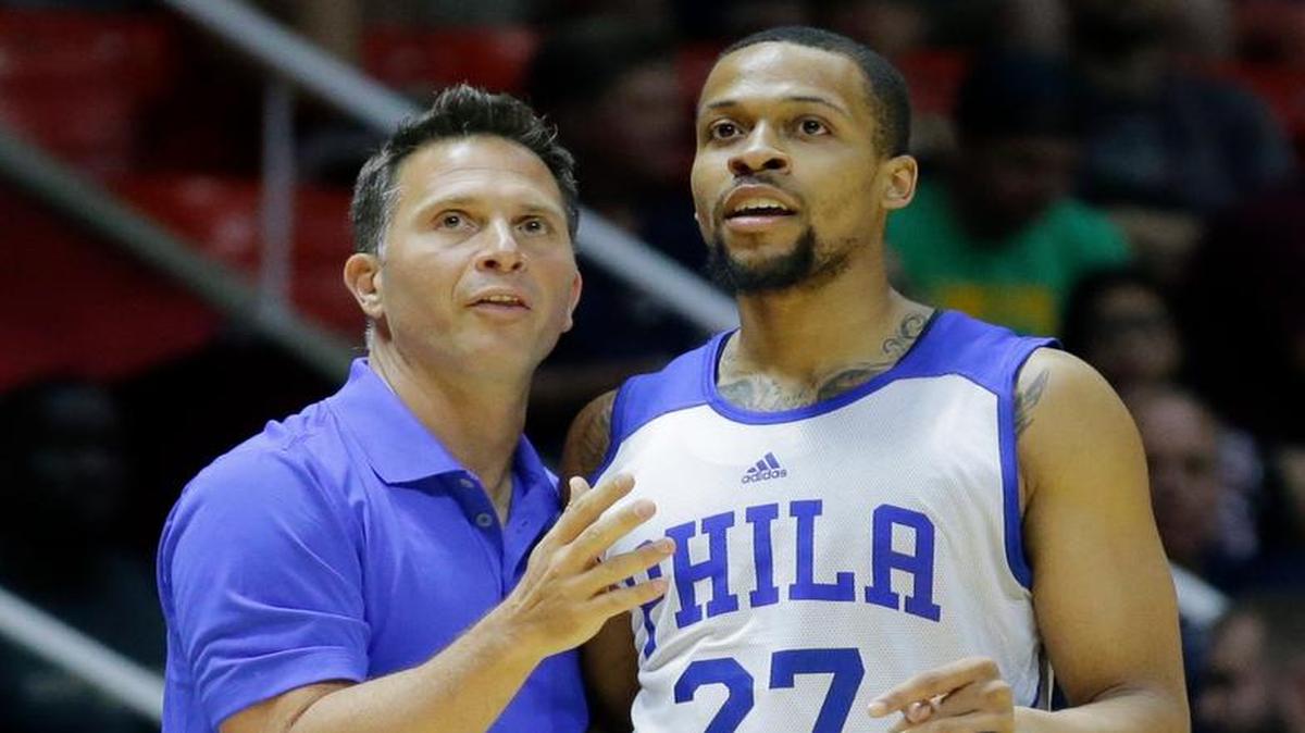 Philadelphia 76ers assistant coach Billy Lange spoke with Philadelphia 76ers guard Isaiah Briscoe (27) during the first half of an NBA summer league basketball game against the Boston Celtics on Monday, July 3, 2017, in Salt Lake City.