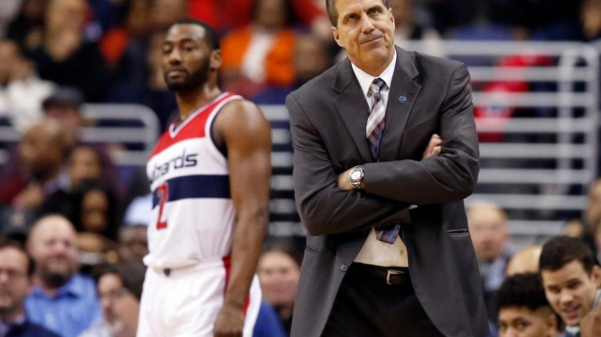 Wizards Coach Randy Wittman and point guard John Wall during the first half against the Miami Heat on Jan. 20, 2016, in Washington.