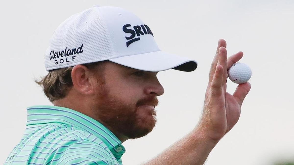 J.B. Holmes reacted after finishing his second round with a par on the ninth hole at the U.S. Open at Erin Hills in Wisconsin on Friday.