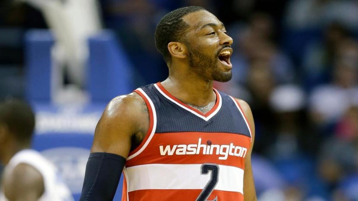 The Wizards’ John Wall reacted a after making a three-point shot during the second half against the Magic on Saturday, Jan. 9, 2016, in Orlando, Fla. Washington won 105-99.