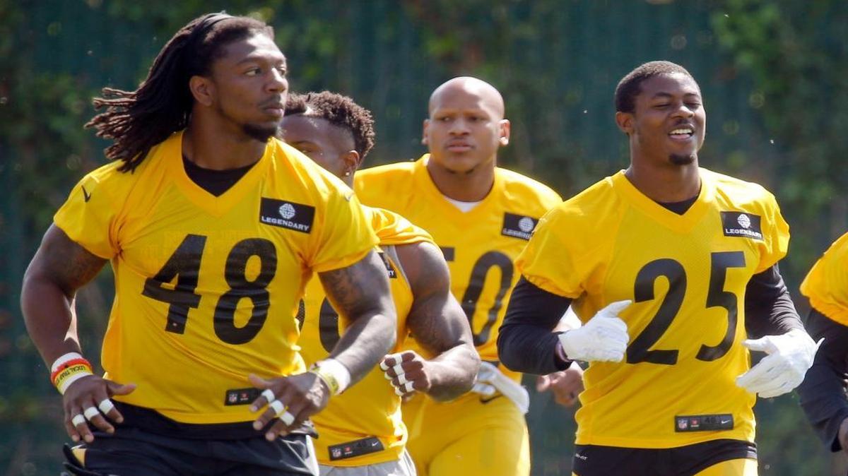 Pittsburgh Steelers cornerback Artie Burns (25), outside linebacker Bud Dupree (48) and inside linebacker Ryan Shazier (50) warm up for drills during practice on Tuesday, May 24, 2016, in Pittsburgh. Burns, Dupree, and Shazier are the Steelers top draft picks from the last three years.