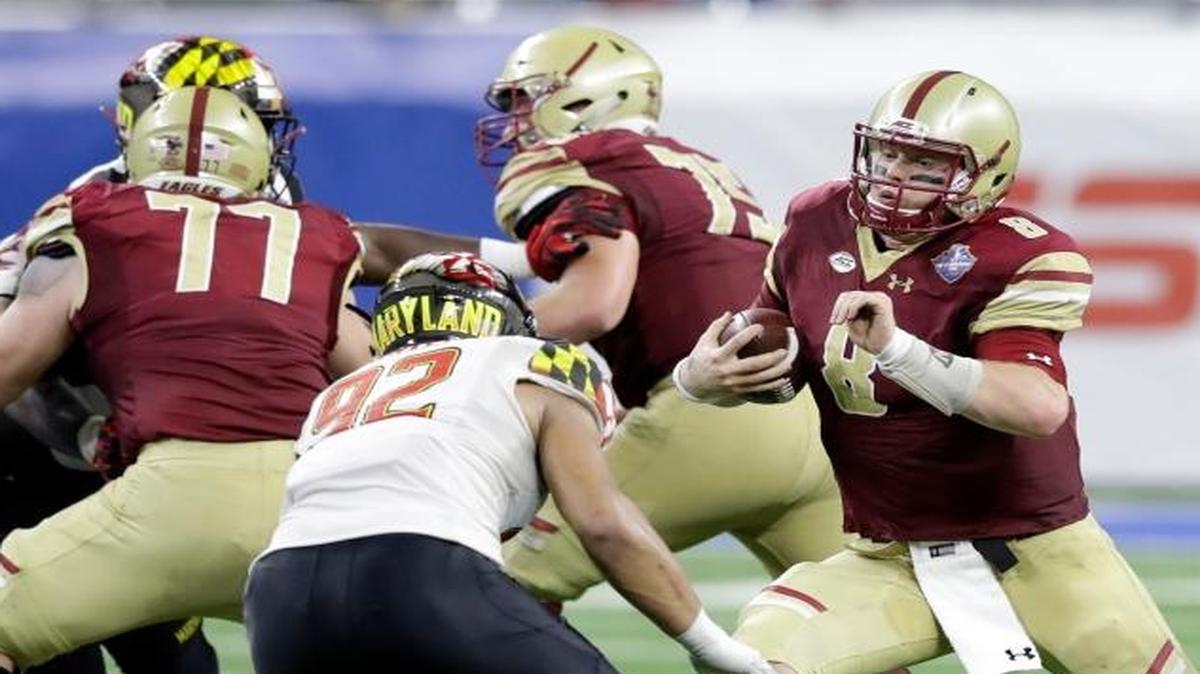 Boston College quarterback Patrick Towles scrambles during the second half of the Quick Lane Bowl NCAA college football game against Maryland, Monday, Dec. 26, 2016, in Detroit.
