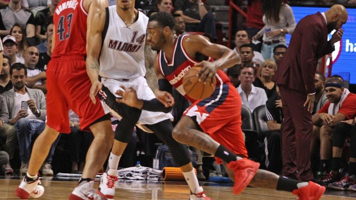 The Washington Wizards' John Wall goes to the basket during the second quarter on Monday, Dec. 7, 2015, at AmericanAirlines Arena in Miami.