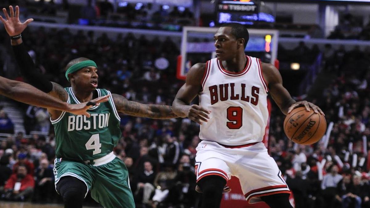 The Chicago Bulls' Rajon Rondo (9) drives past Boston Celtics' Isaiah Thomas (4) during the first quarter of an NBA basketball game Thursday, Oct. 27, 2016, in Chicago.