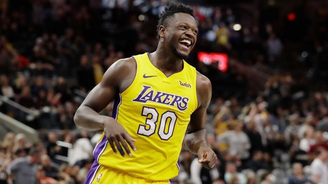 Los Angeles Lakers forward Julius Randle (30) celebrates after he made a late score to help lift the team past the San Antonio Spurs during the second half of an NBA basketball game, Saturday, March 3, 2018, in San Antonio. Los Angeles won 116-112.