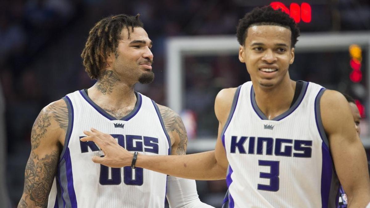 Sacramento Kings center Willie Cauley-Stein (00) and teammate Sacramento Kings forward Skal Labissiere (3) walk to the bench as they celebrate their lede against the Orlando Magic during their game at Golden 1 Center in Sacramento on Monday, March 13, 2017.
