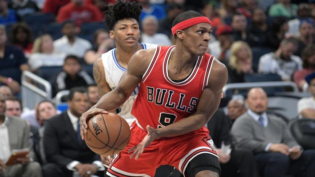 Chicago Bulls guard Rajon Rondo (9) gets set to pass the ball in front of Orlando Magic guard Elfrid Payton, rear, during the second half of an NBA basketball game in Orlando, Fla., Wednesday, March 8, 2017. The Magic won 98-91.