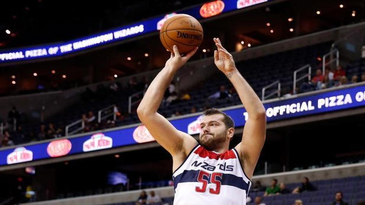 Washington Wizards center Josh Harrellson (55) shot a three-pointer in the second half of a preseason NBA basketball game against Paschoalotto Bauru on Sunday, Oct. 11, 2015, in Washington. The Wizards won 134-100.
